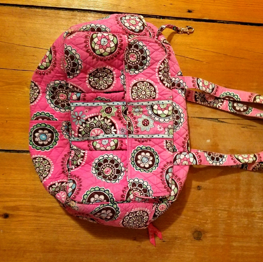 Pink diaper bag.